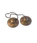 Cymbals with embossed mantra designs